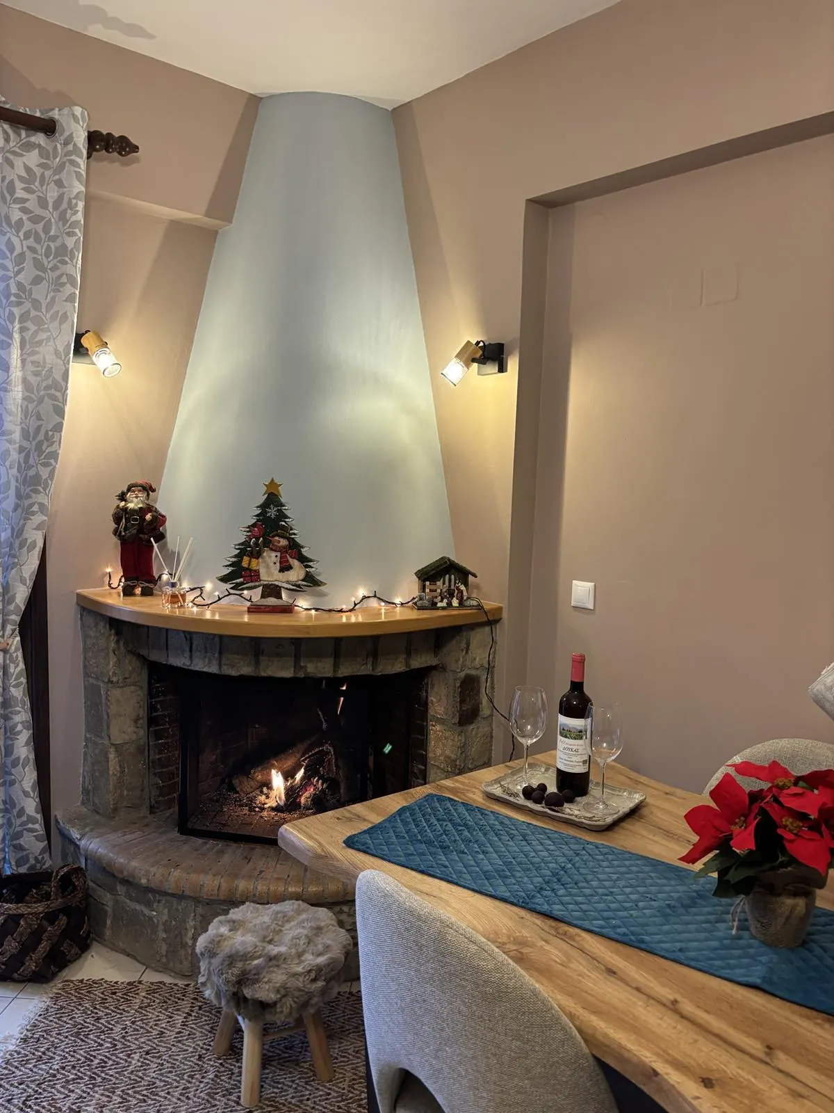The fireplace decorated for Christmas
